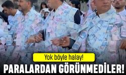 Ultra zengin düğün: Halay çekenler üstündeki paralardan görünmedi