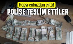Enkazdan çıkan on binlerce doları polise teslim ettiler