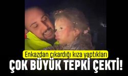 Enkazdan çıkardığı küçük kızı sallayıp videoya çekti