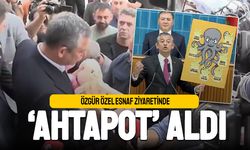 Özgür Özel esnaf ziyaretinde 'Ahtapot' aldı