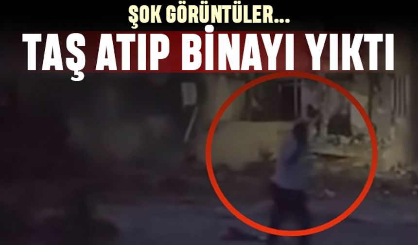 Şok görüntü: Malatya'da bir kişi taş atarak binayı yıktı