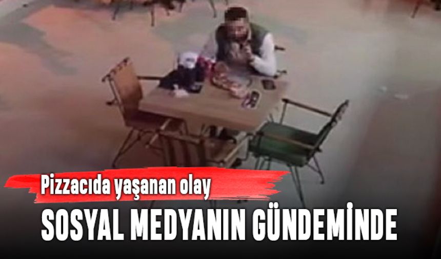 Elazığ'da pizza yiyen kişi yaptığı hareketle gündem oldu